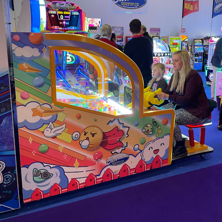 Parent and child playing kiddie amusement